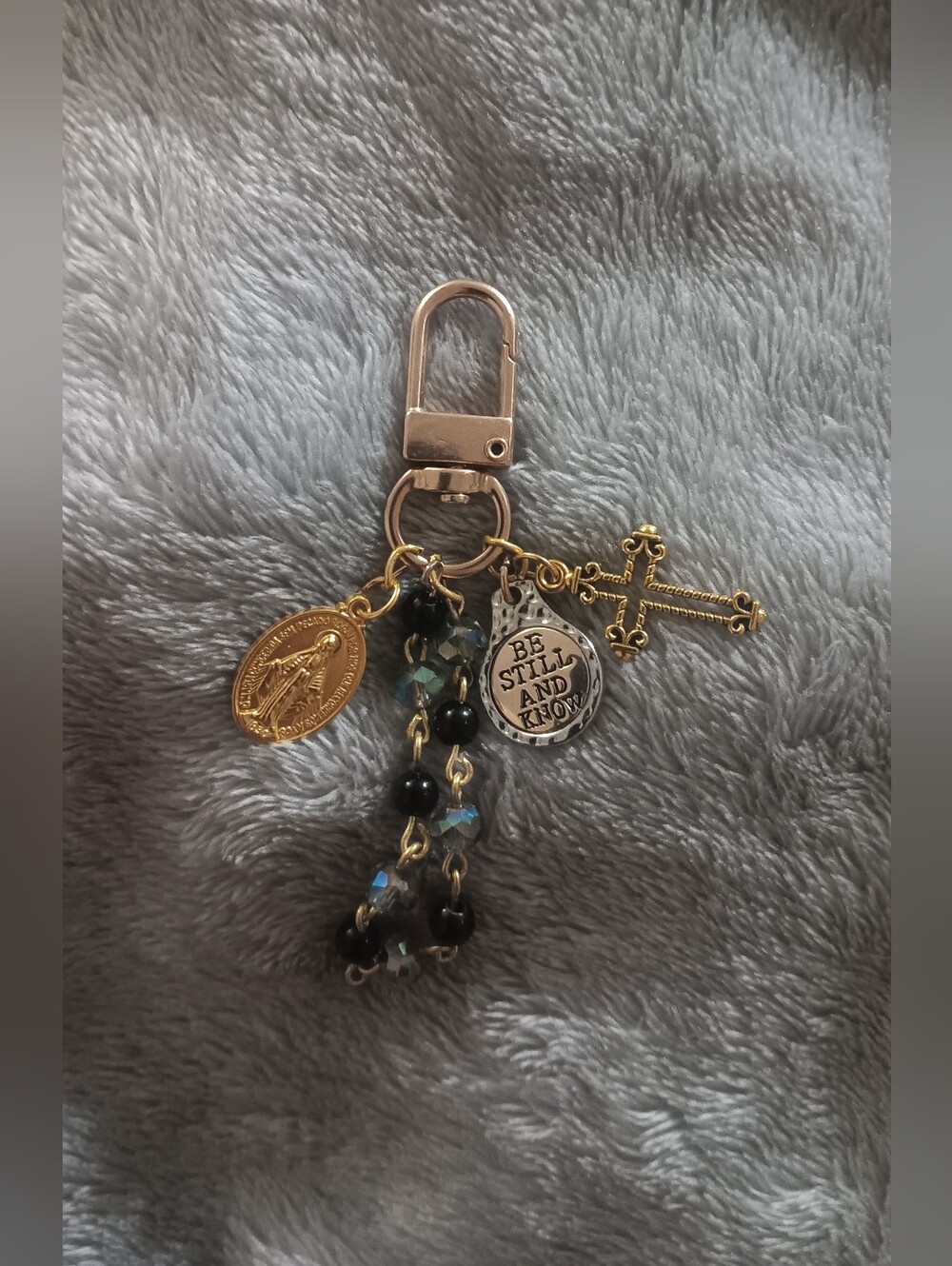 Gold-Tone Religious Charm Keychain with Black and Blue Beads